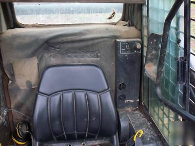 Bobcat 7753 skidsteer loader with attachments
