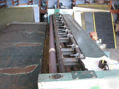 E-215 groovemaster duct board machine