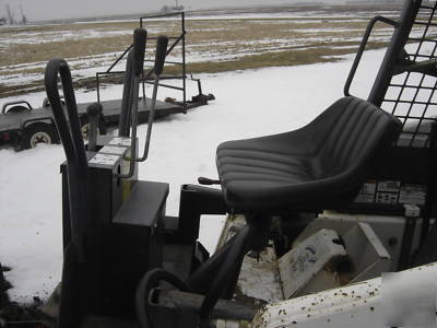 Bobcat 742 b with backhoe and auger