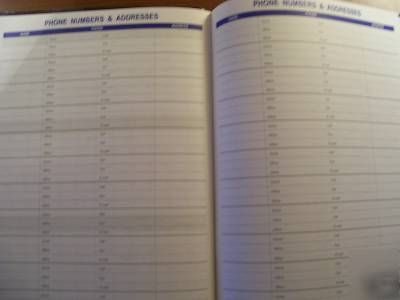 New 2010 monthly planner tan 7.5